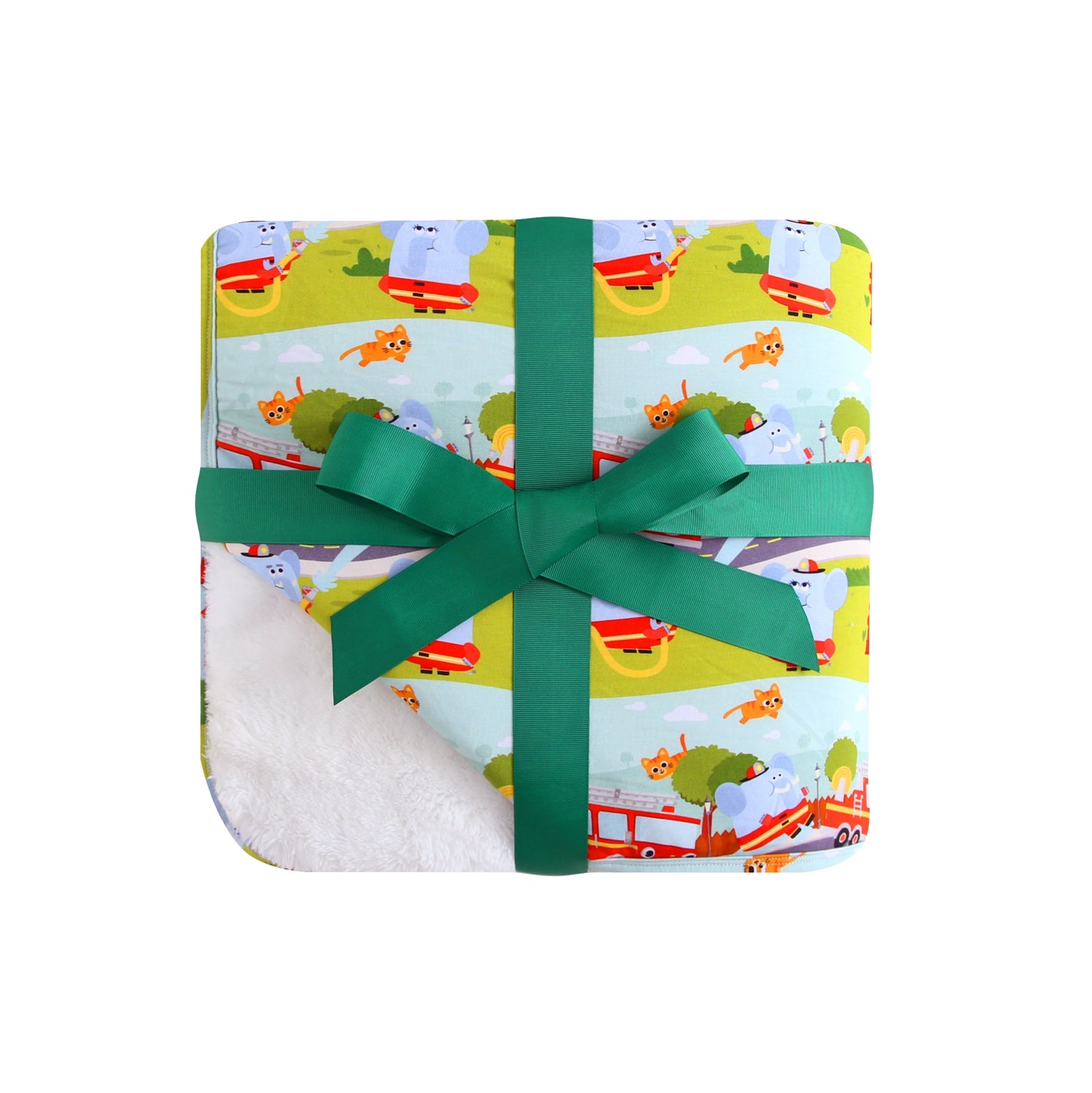 A folded blanket with a green ribbon, featuring a pattern of elephants and cats with firetrucks.