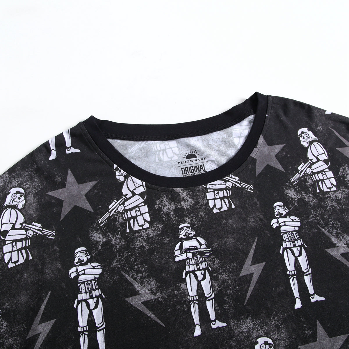 Black t-shirt with a repeating pattern of white stormtroopers and grey stars.