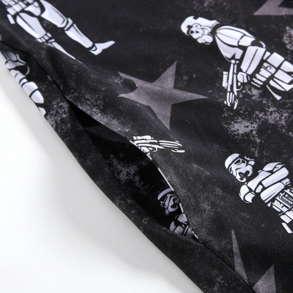 Black sleep tee with a repeating pattern of white Stormtroopers and stars.