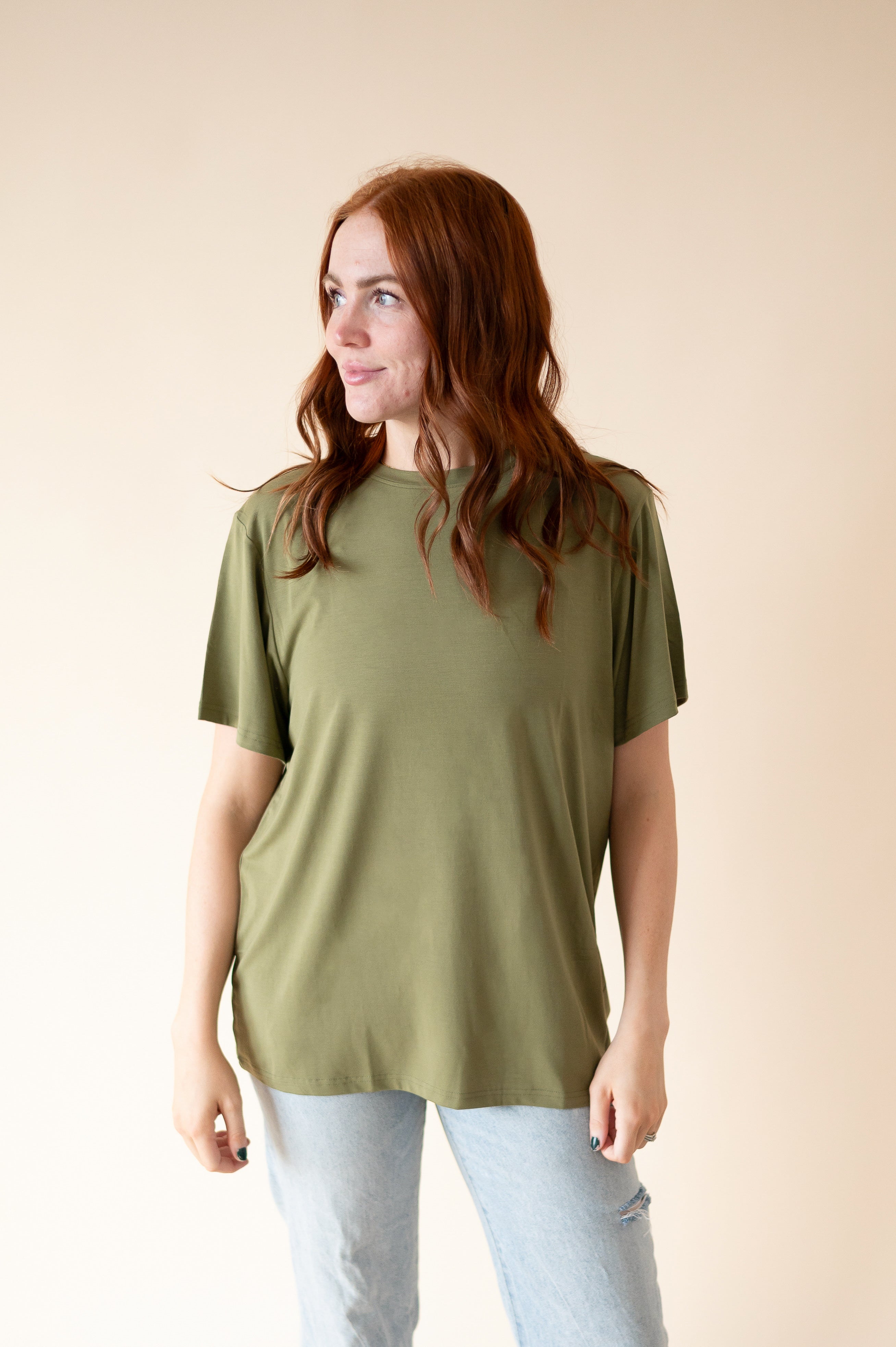 Oversized olive green tencel modal t-shirt on a woman.