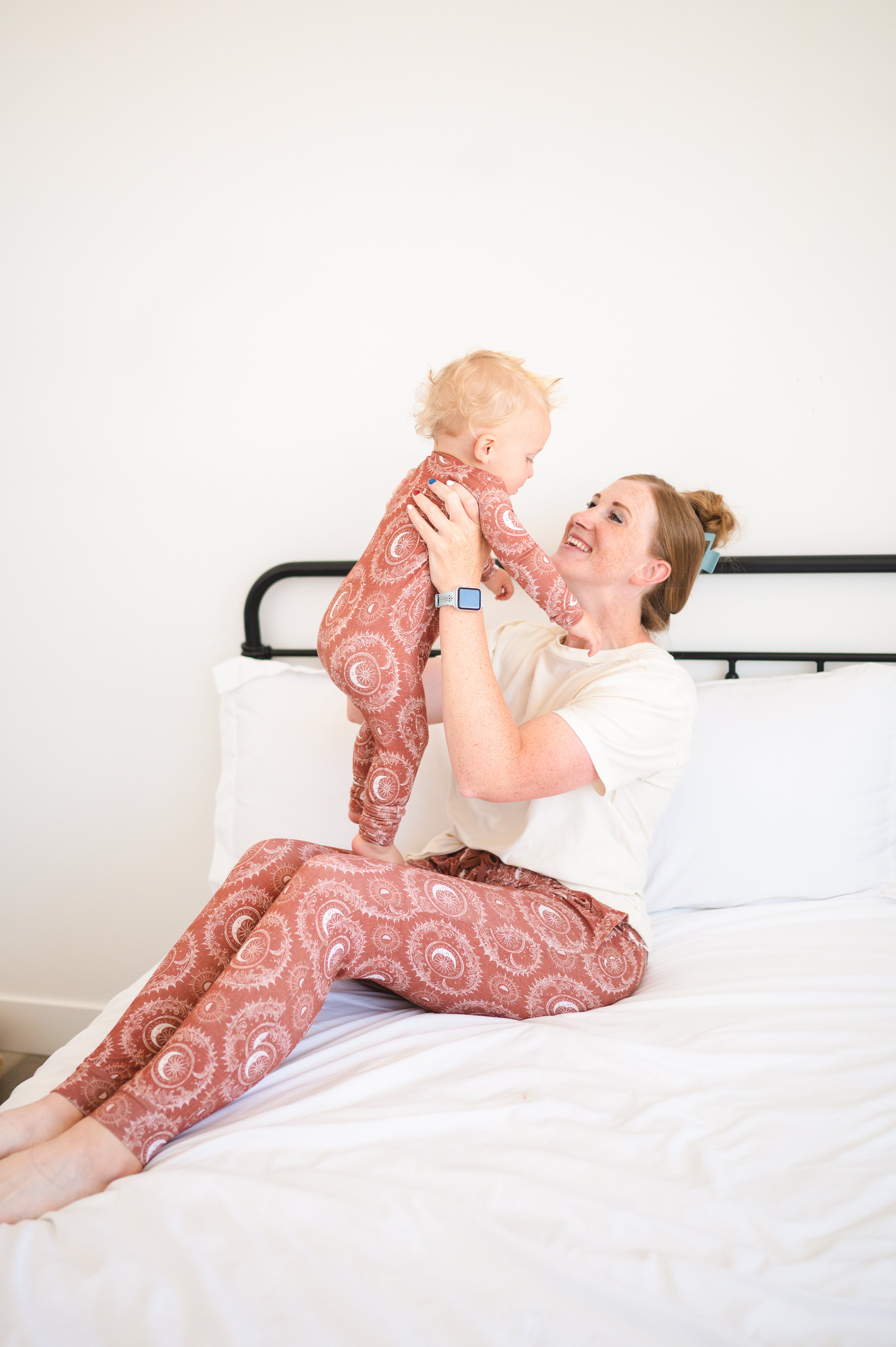 Women's rust moon print bamboo joggers with a relaxed fit.
