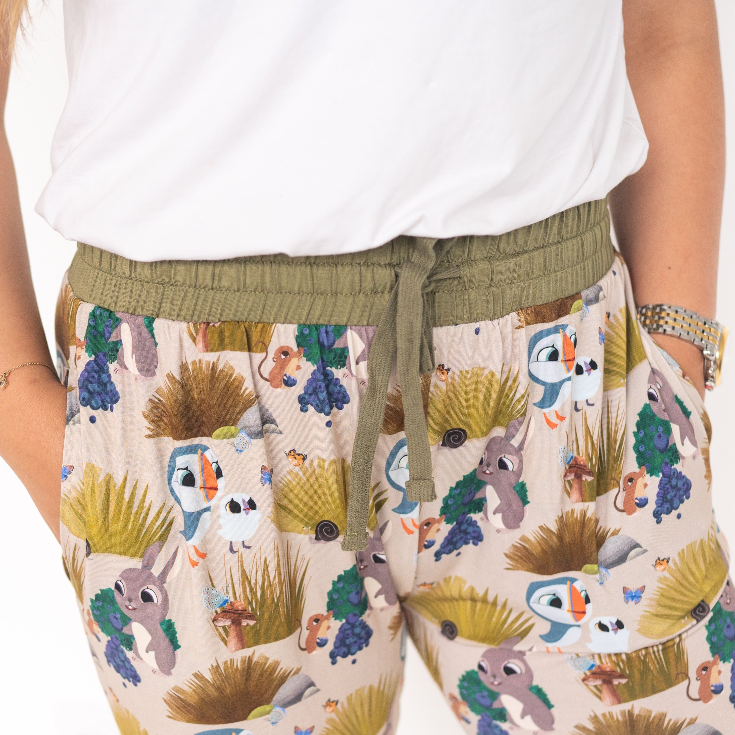 Women's bamboo joggers with a Puffin Rock print and olive green waistband.