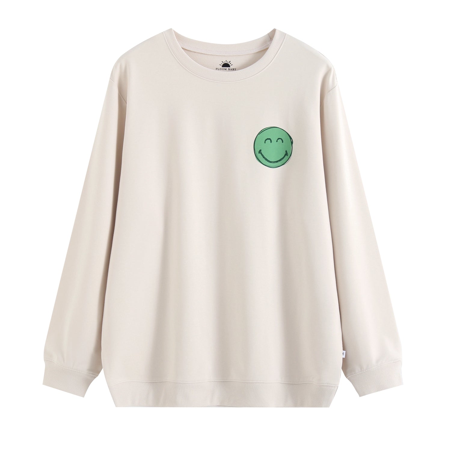 A cream crewneck sweatshirt with a green smiley face graphic.