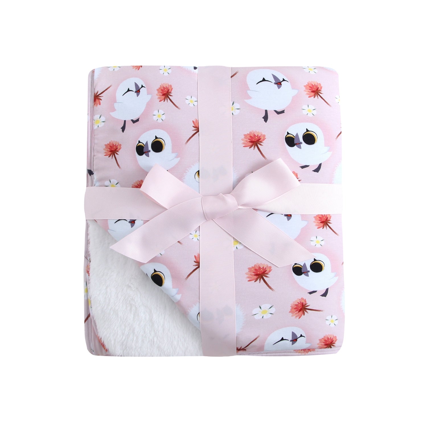 A pink blanket with white puffins and flowers, tied with a pink ribbon.