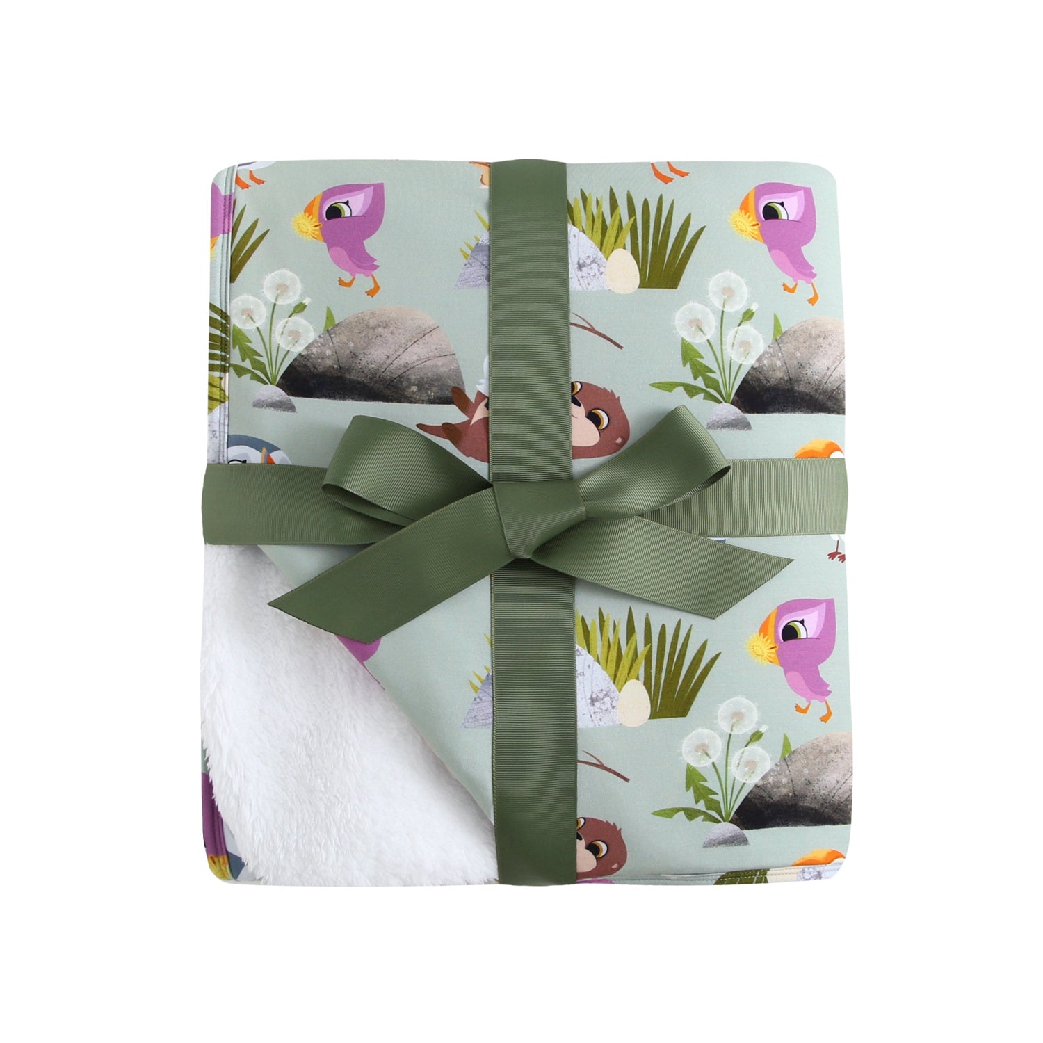 A plush blanket with a Puffin Rock™ pattern, tied with a green ribbon.
